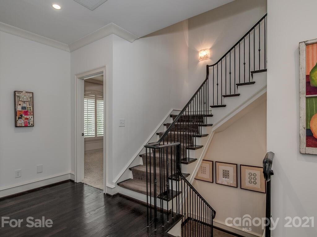 1056 Bolling Road Charlotte, NC 28207 - Photo 7 of 48 a view of entryway with wooden floor
