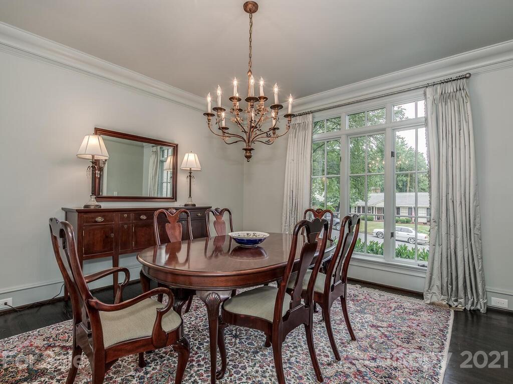 1056 Bolling Road Charlotte, NC 28207 - Photo 9 of 48 a view of a dining room with furniture window and outside view
