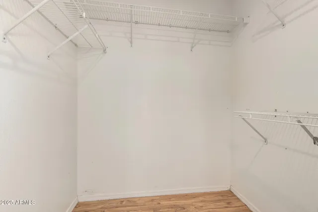 a view of a room with racks on the wall