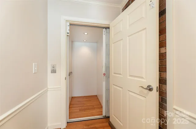 a view of a bathroom with a sink and mirror