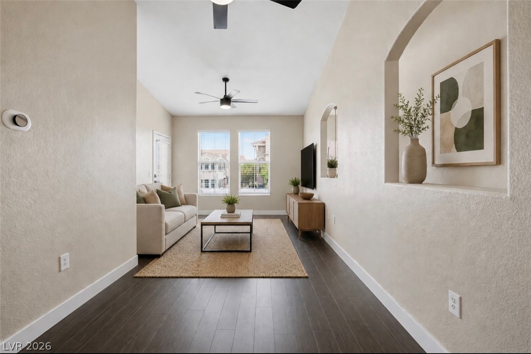 10550 West Alexander Road, Unit 2177 Las Vegas, NV 89129 - Photo 4 of 19 This airy living space features warm flooring, abundant natural light, and elegant ceiling fans.