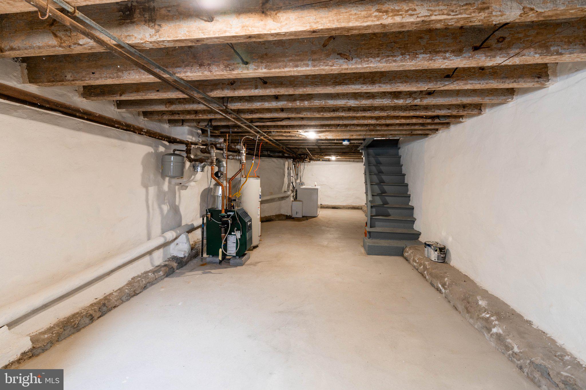 2433 South 3rd Street Philadelphia, PA 19148 - Photo 25 of 25 Spacious basement with rustic beams.