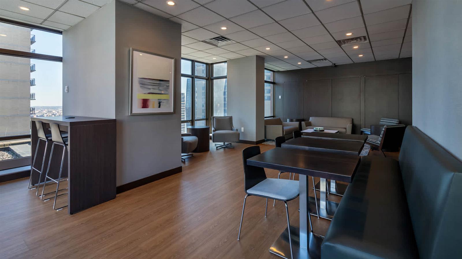 300 East 39th Street, Unit 21E Manhattan, NY 10016 - Photo 5 of 10 a living room with furniture and a wooden floor