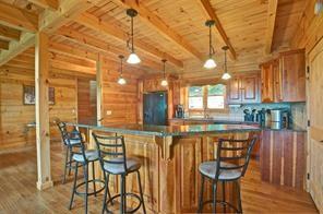93 Bear Track Trail Morganton, GA 30560 - Photo 12 of 12 a dining room with furniture and wooden floor