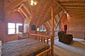 93 Bear Track Trail Morganton, GA 30560 - Photo 8 of 12 a view of a house with backyard and sitting area