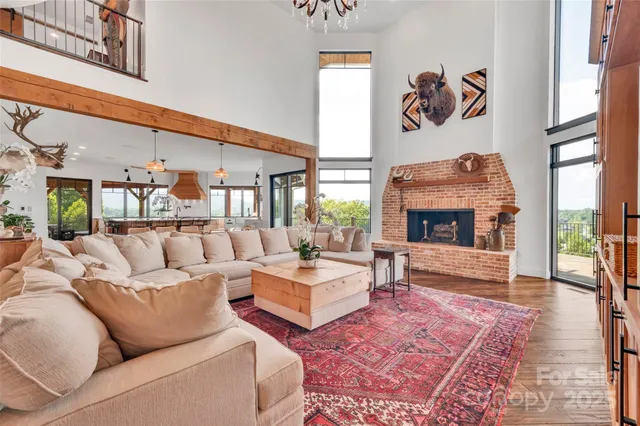a bathroom with a double vanity sink mirror and bathtub