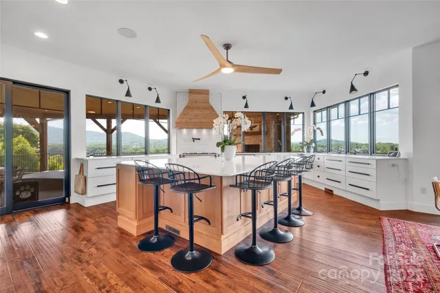 a view of swimming pool with lake view and mountain view