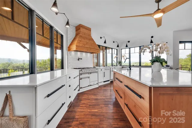 an aerial view of a house with a big yard