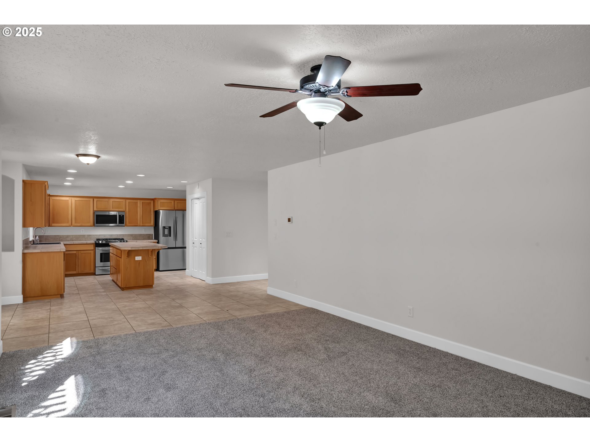 2310 Northwest Gale Street Albany, OR 97321 - Photo 13 of 48 a view of a livingroom with a flat screen tv