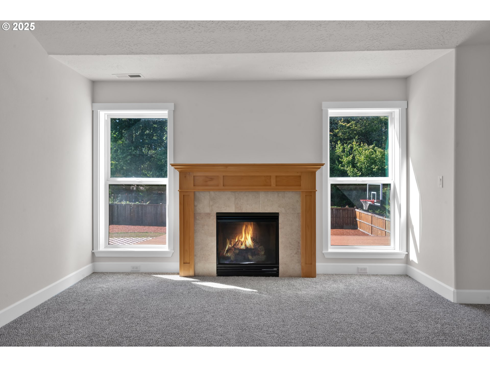 2310 Northwest Gale Street Albany, OR 97321 - Photo 26 of 48 a living room with a fireplace