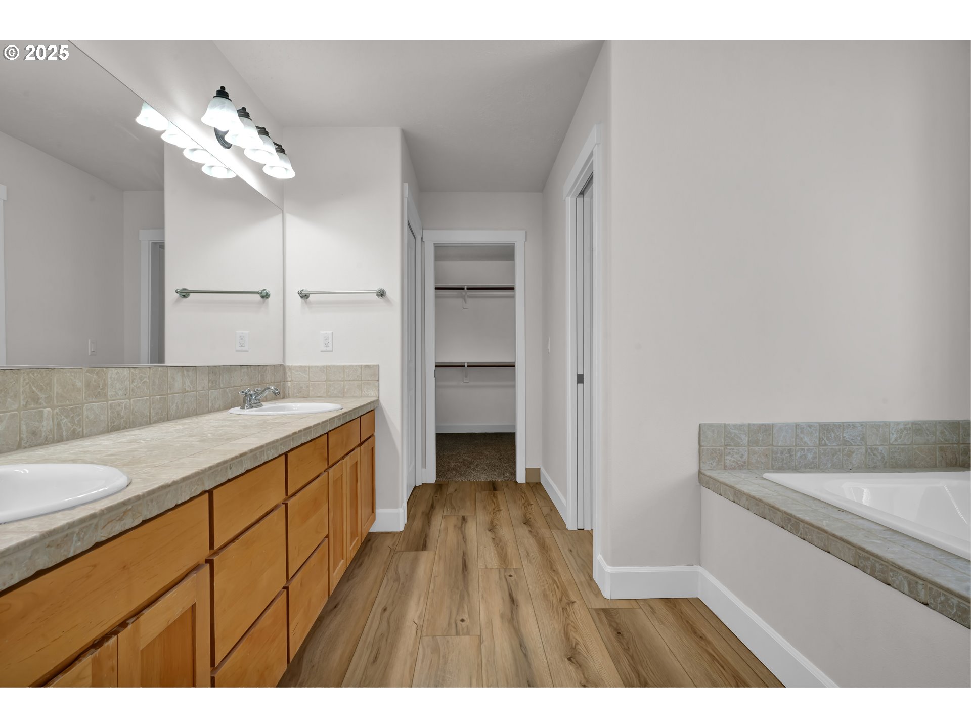 2310 Northwest Gale Street Albany, OR 97321 - Photo 27 of 48 a bathroom with a sink and a mirror