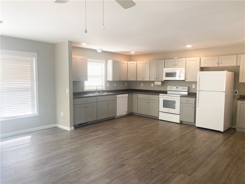 142 Burns Hill Street Liberty, SC 29657 - Photo 4 of 12 This spacious kitchen with ample cabinetry provides a bright and functional culinary space.