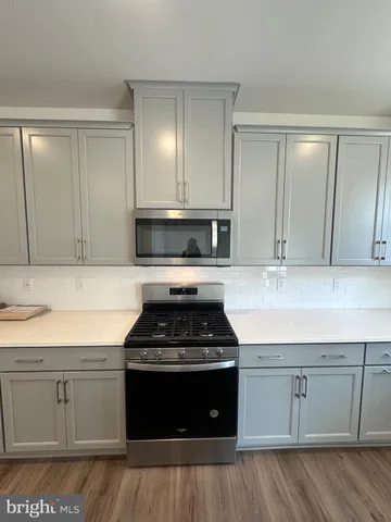 a view of a balcony with furniture