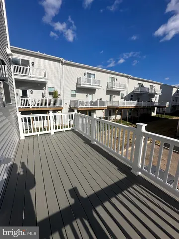 a view of balcony with furniture