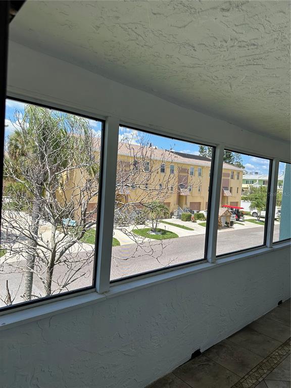 1 Windrush Boulevard, Unit 84 Indian Rocks Beach, FL 33785 - Photo 18 of 19 Back Porch with view.