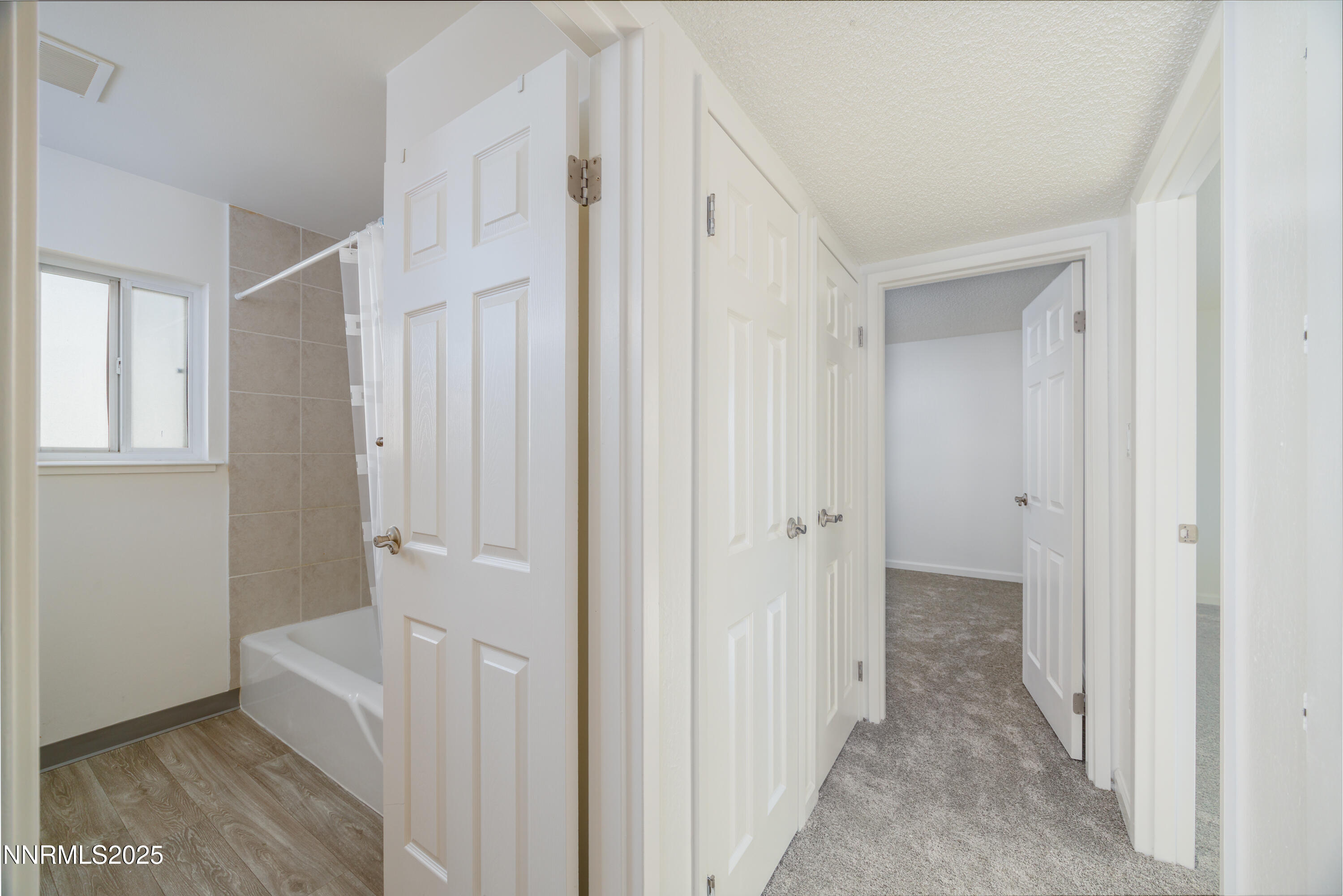140 Griswold Way, Unit C Reno, NV 89503 - Photo 8 of 17 a view of a bathroom with a sink and mirror