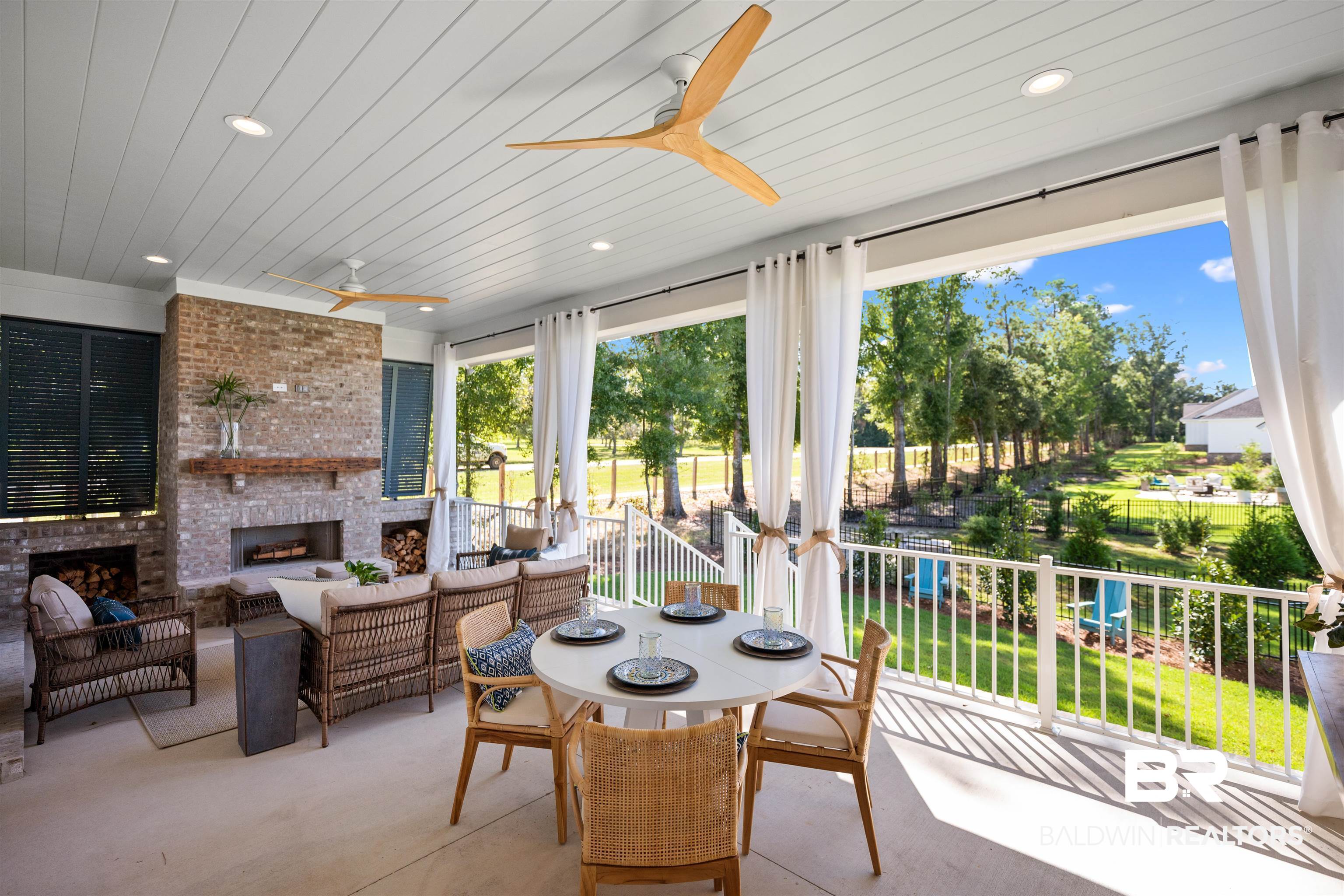 156 Hyacinth Street Fairhope, AL 36532 - Photo 25 of 61 View of patio / terrace featuring an outdoor living space with a fireplace, ceiling fan, and outdoor dining space