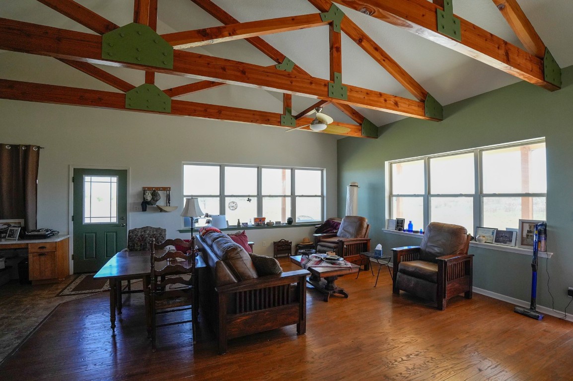 6455 Gebert Road Muldoon, TX 78949 - Photo 15 of 44 a living room with furniture a ceiling fan a rug and a window