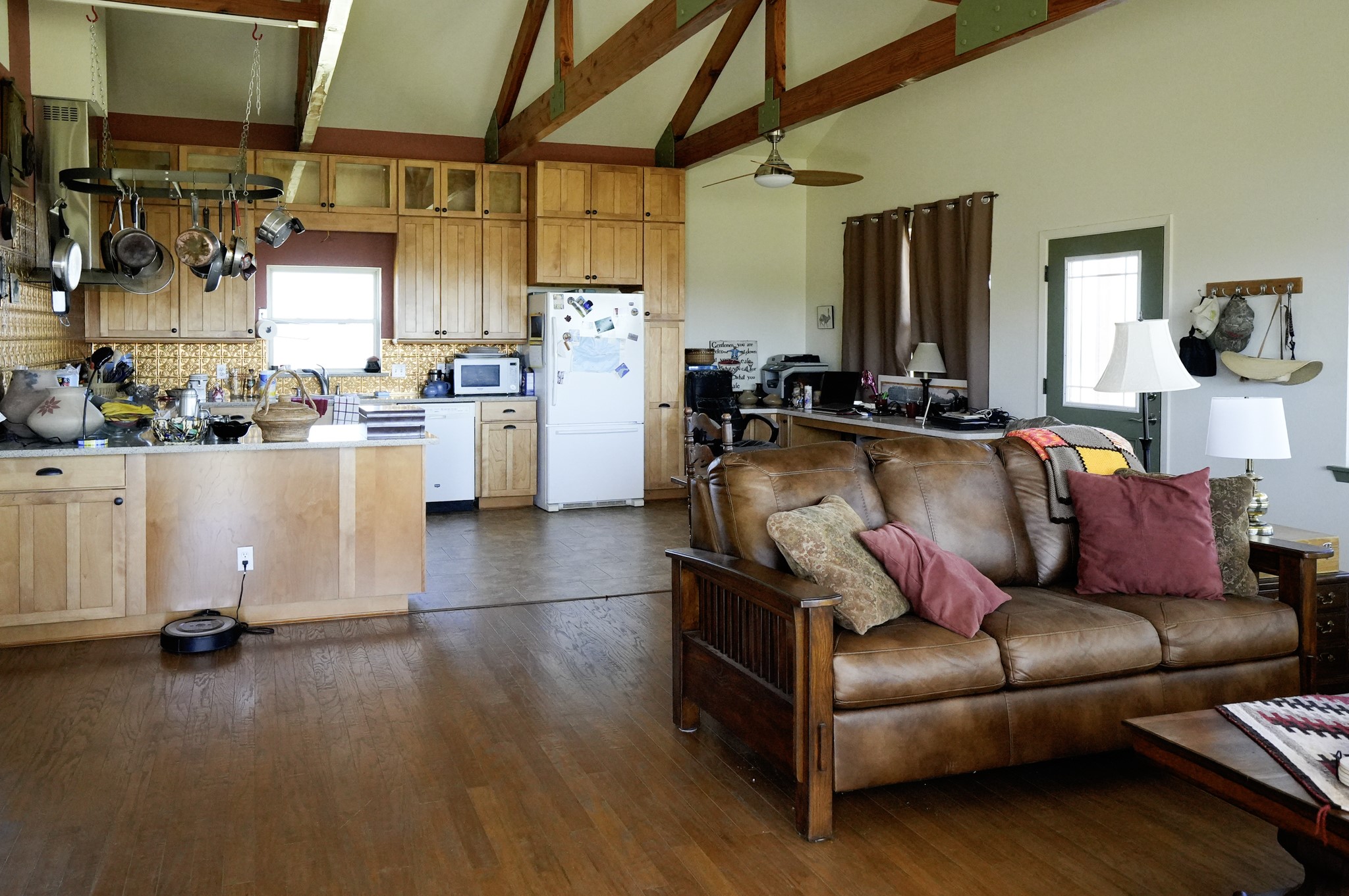 6455 Gebert Road Muldoon, TX 78949 - Photo 2 of 44 a living room with furniture and a kitchen view