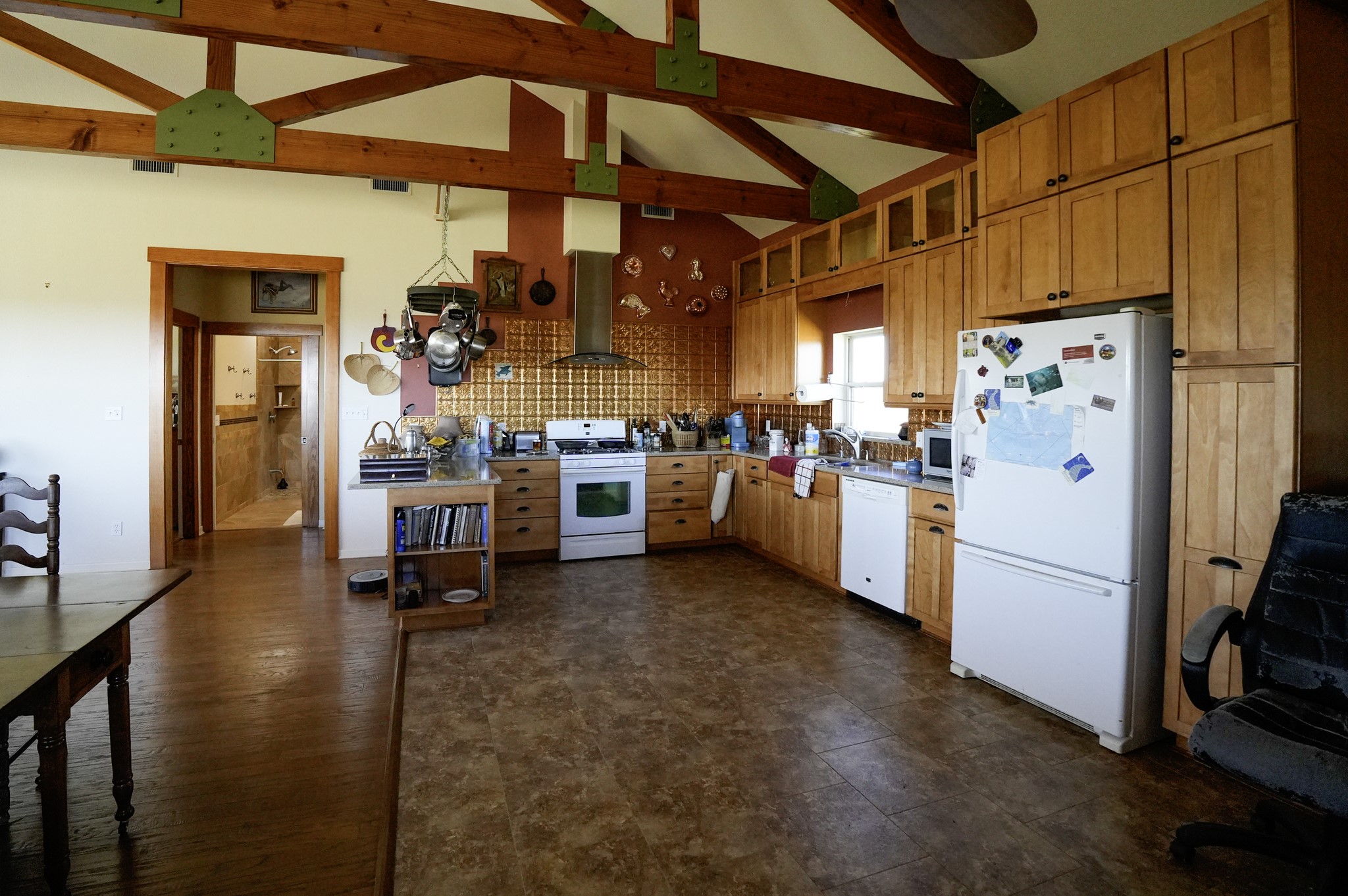 6455 Gebert Road Muldoon, TX 78949 - Photo 6 of 44 a kitchen with refrigerator and cabinets