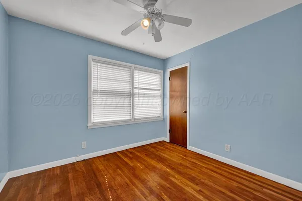 a kitchen with a sink cabinets and window