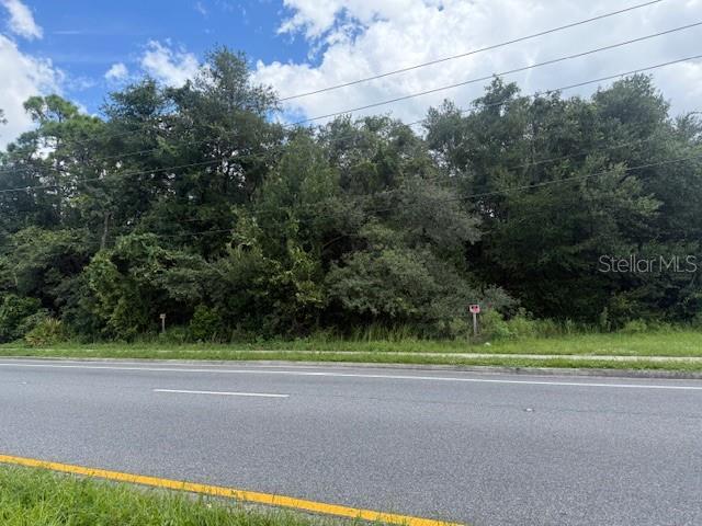 3101 South Goldenrod Road Orlando, FL 32822 - Photo 2 of 3 a view of a yard and a house