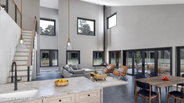 a living room with fireplace furniture and a window