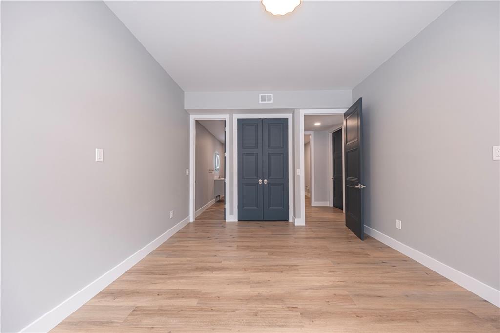1213 Harrison Court Export, PA 15632 - Photo 35 of 41 a view of an empty room with wooden floor