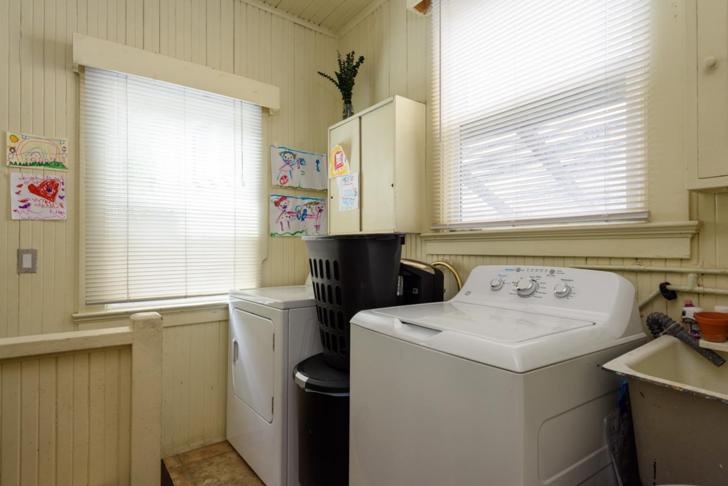 415 Primrose Road Burlingame, CA 94010 - Photo 12 of 23 a view of bathroom with a sink and a window