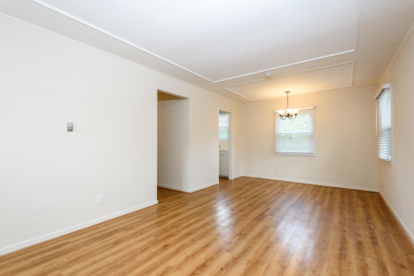 415 Primrose Road Burlingame, CA 94010 - Photo 14 of 23 a view of empty room with wooden floor