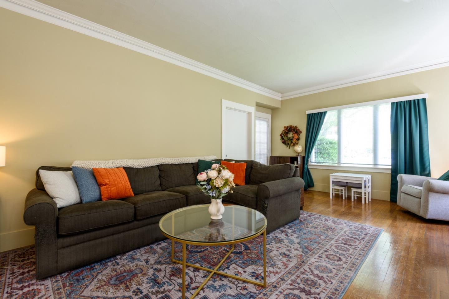 415 Primrose Road Burlingame, CA 94010 - Photo 4 of 23 a living room with furniture and a wooden floor