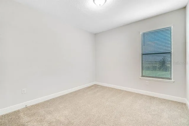 an empty room with a window