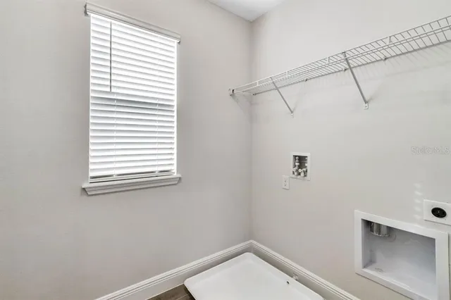 a view of a room that has a window in it