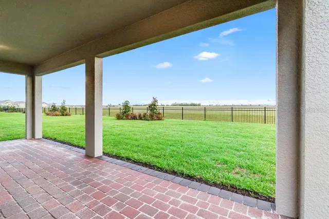 a view of a garden with an outdoor space