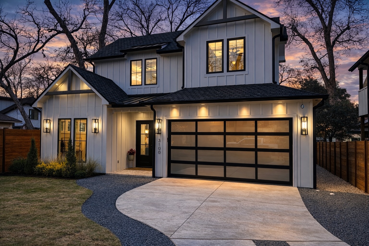 View of front of house featuring board and batten siding, an attached garage, concrete driveway, and roof with shingles