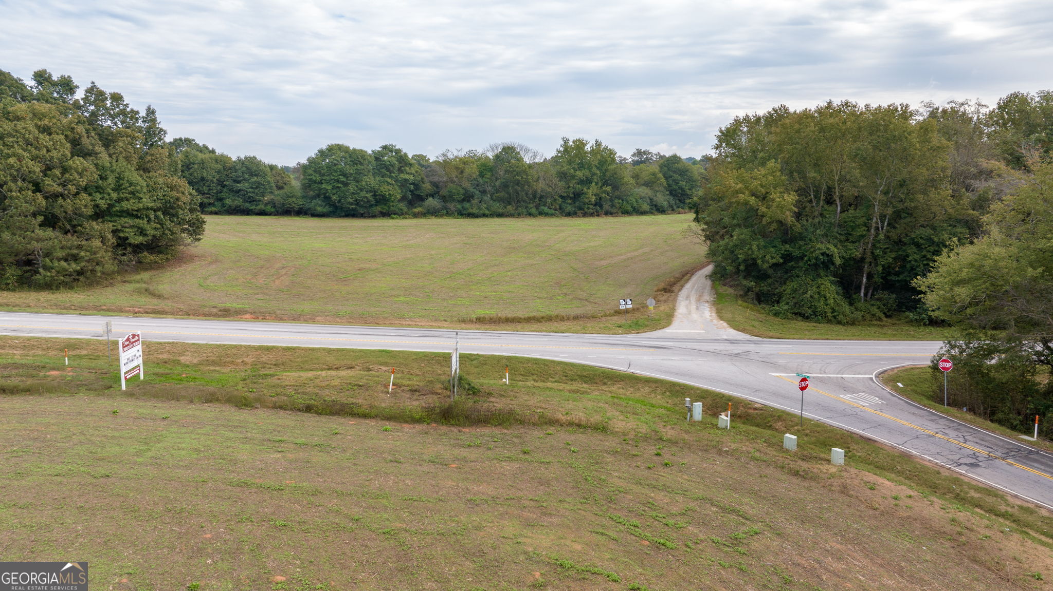 120 Hunnicutt Circle Canon, GA 30520 - Photo 1 of 30 a view of a lake with a yard
