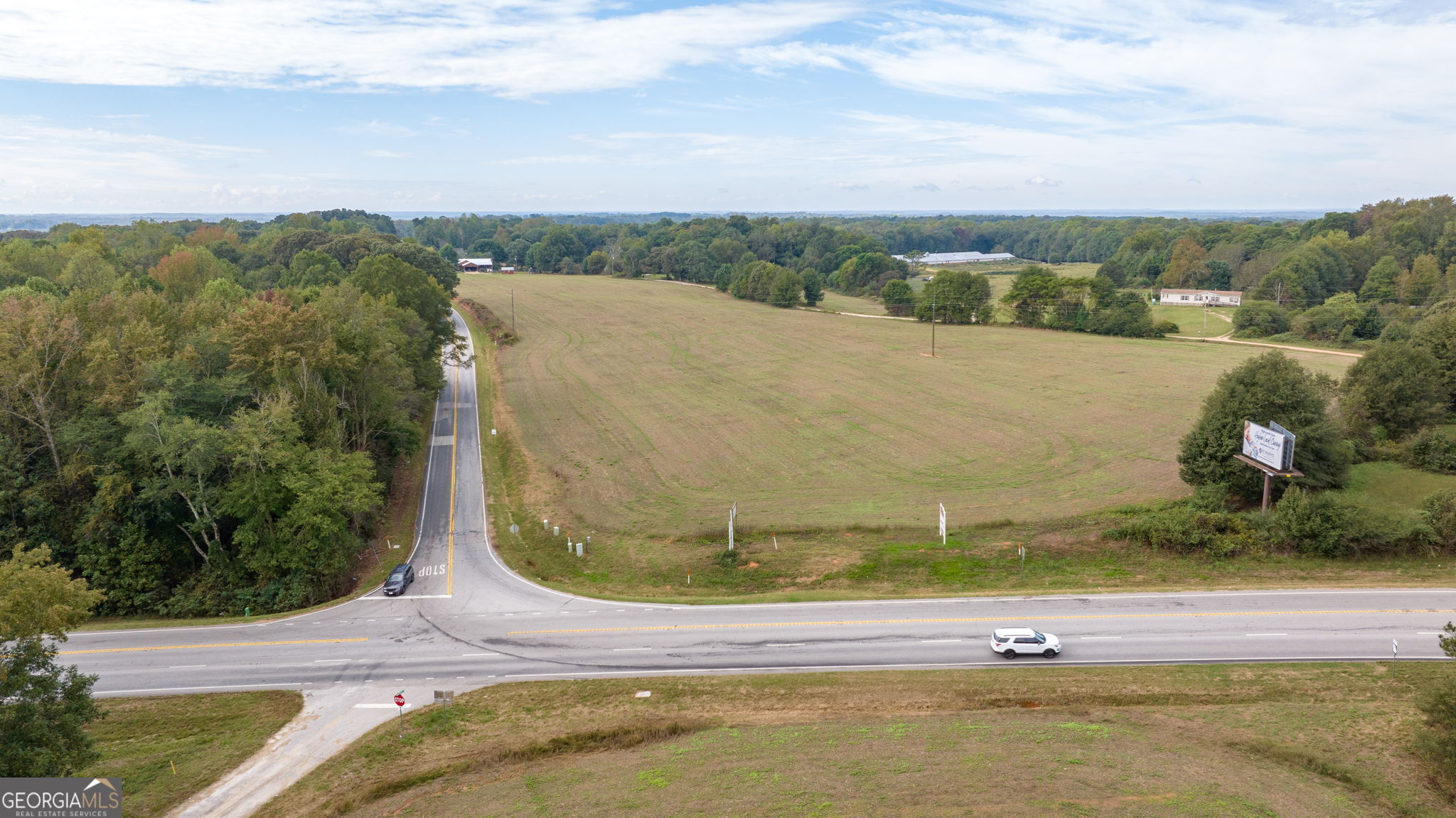 120 Hunnicutt Circle Canon, GA 30520 - Photo 15 of 30 a view of a lake with a mountain in the background