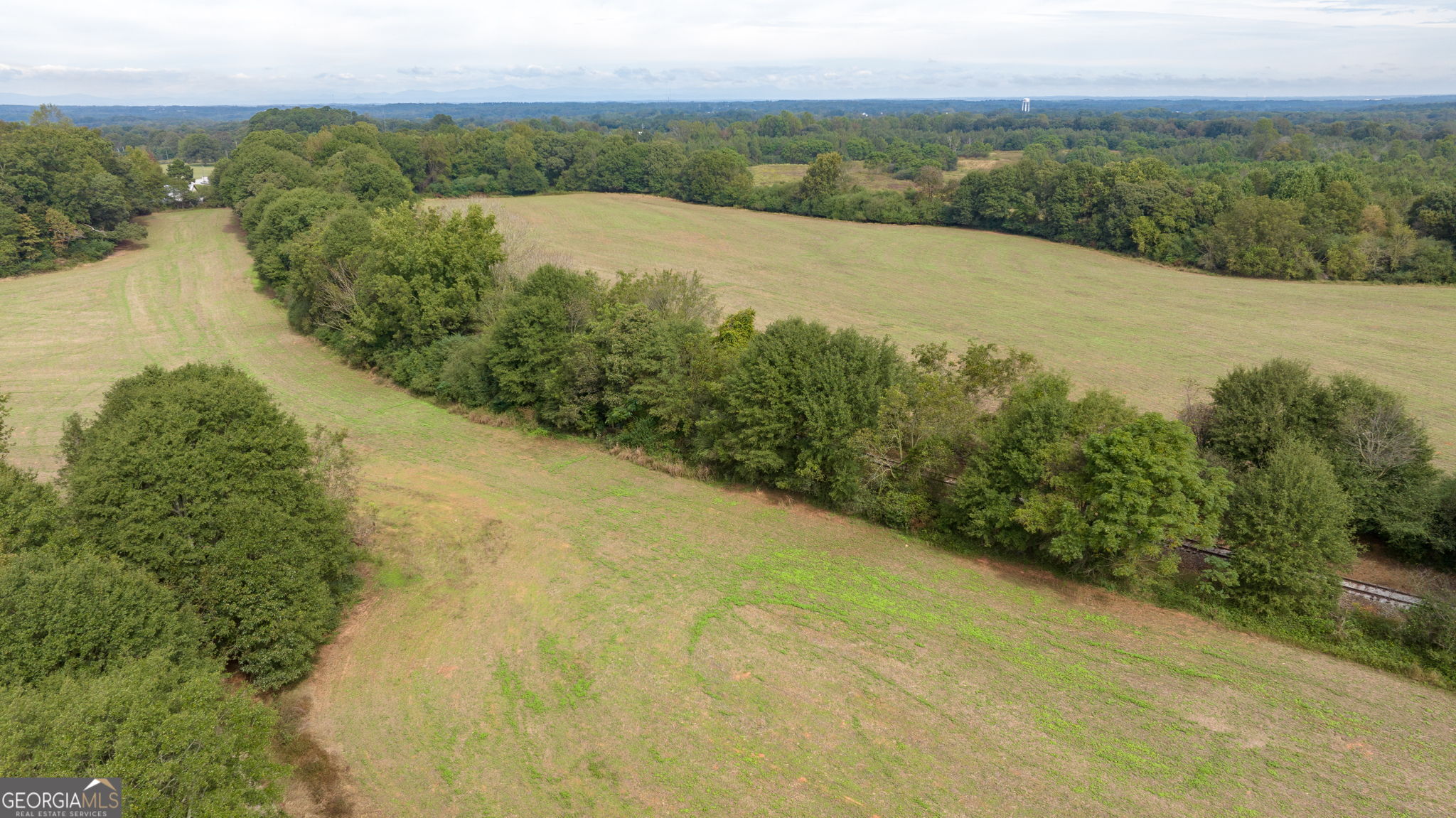 120 Hunnicutt Circle Canon, GA 30520 - Photo 22 of 30 a view of a lake with a mountain in the background