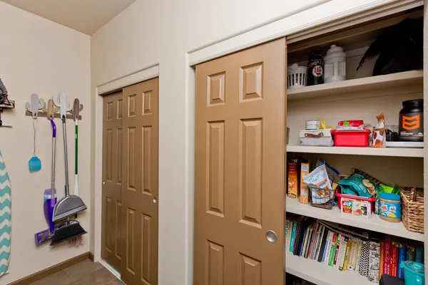 a view of a livingroom with lots of stuff and toys