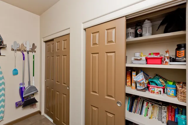 a view of a livingroom with lots of stuff and toys