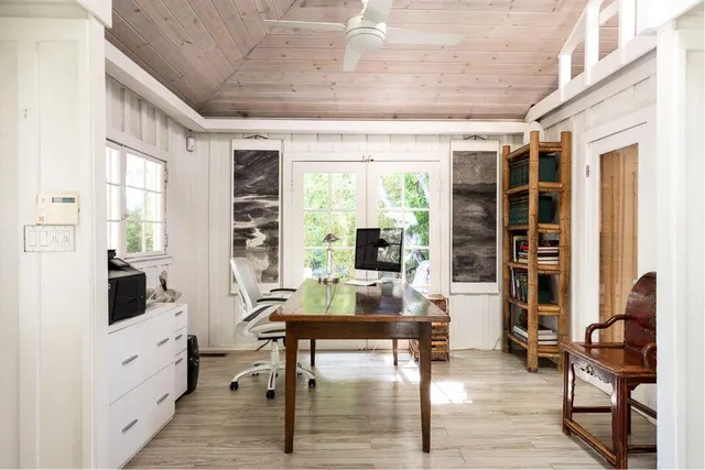 a workspace with furniture window and outside view