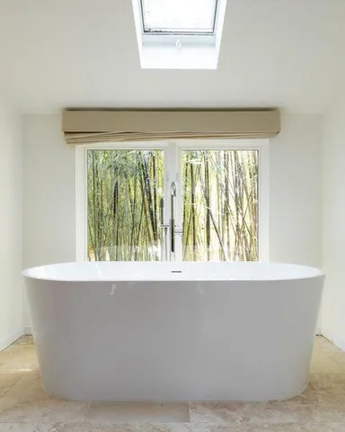 a view of a chairs and table on the wooden floor