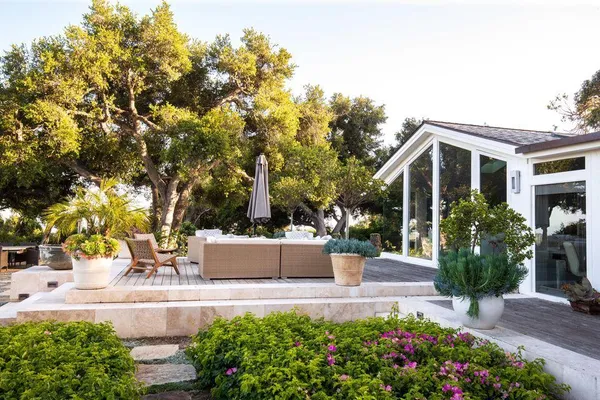a view of a swimming pool with a patio