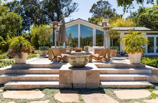 a view of swimming pool with outdoor seating