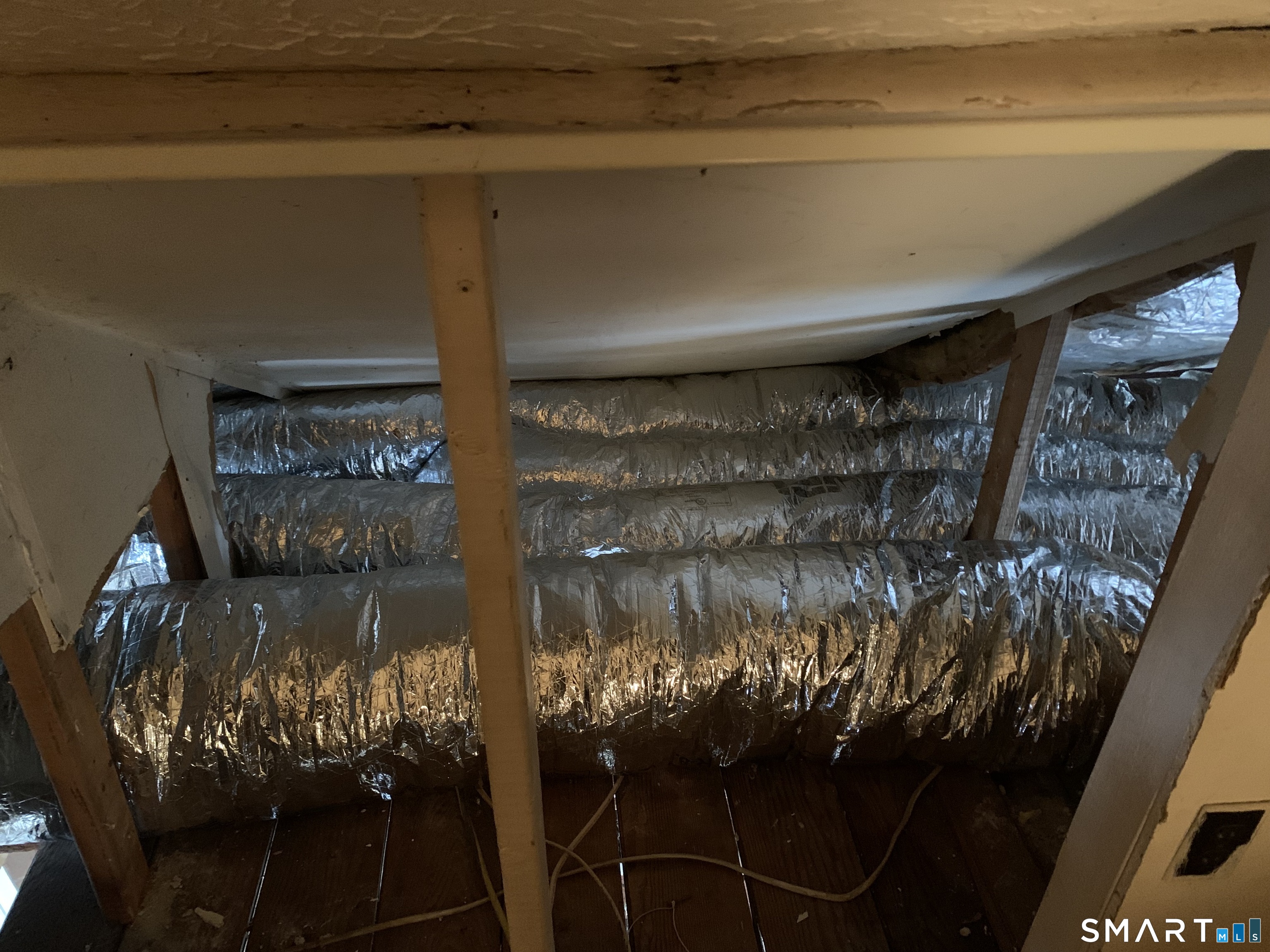 30 Chappell Street New London, CT 06320 - Photo 17 of 17 a room with water heater and wall