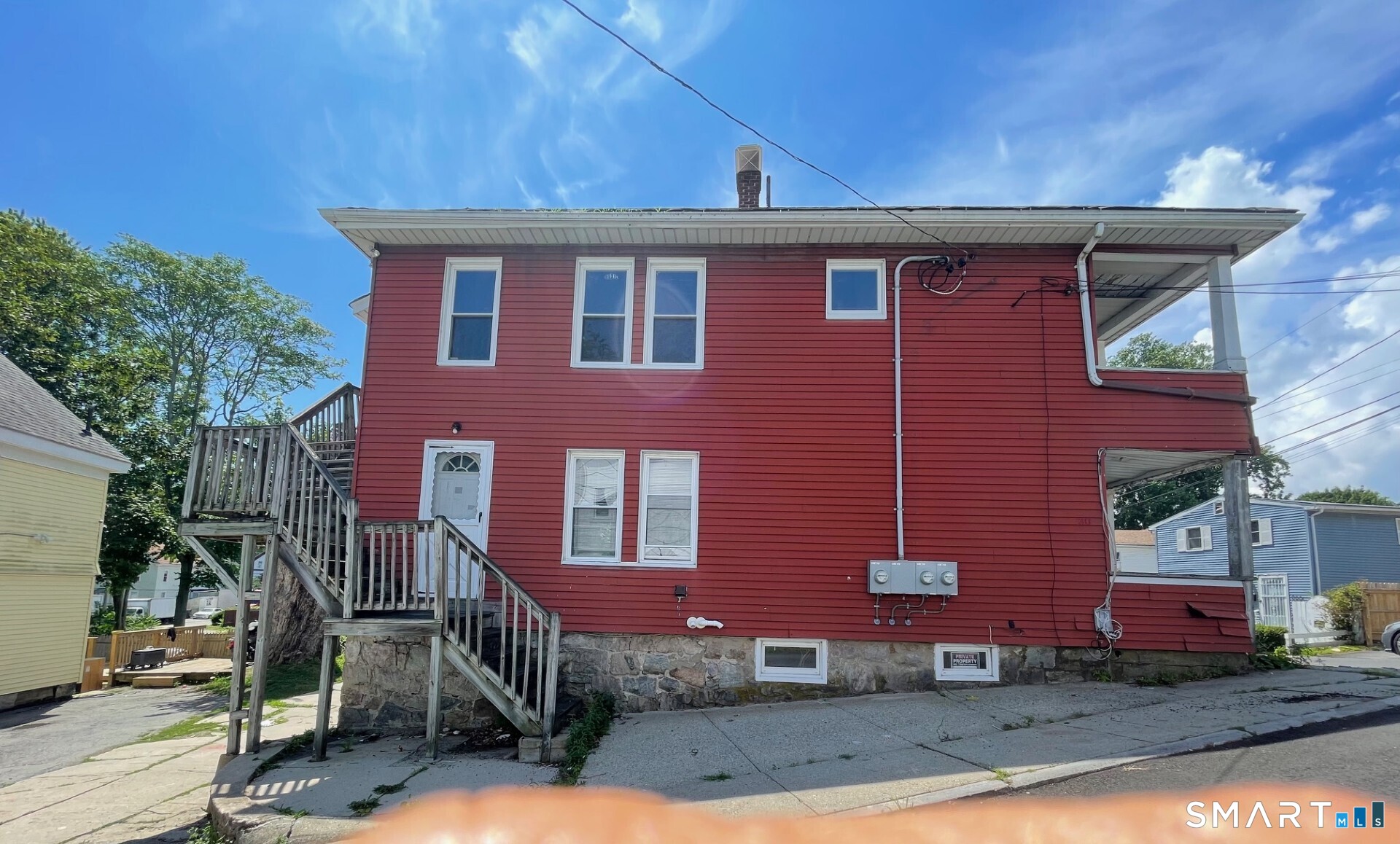 30 Chappell Street New London, CT 06320 - Photo 2 of 17 a front view of a house with a yard