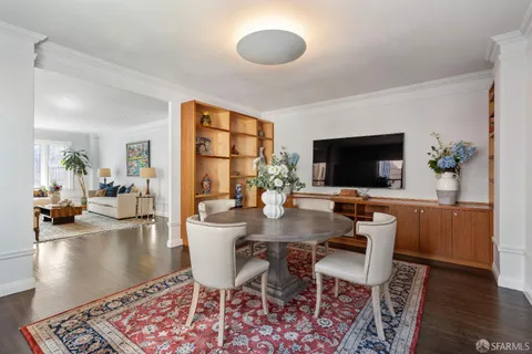 a view of a dining room with furniture
