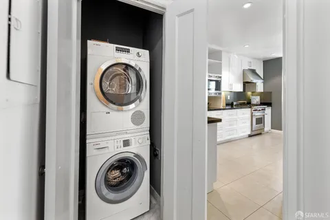 a view of a kitchen with washer and dryer