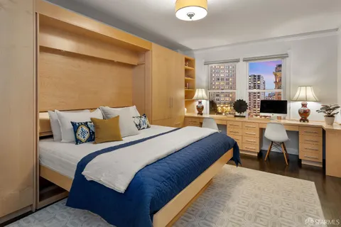 a bed room with a bed and furniture