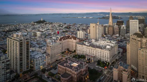 a view of a city with tall buildings